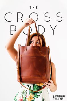 The gorgeous leather crossbody tote available in honey! leather - handmade - totewell - transport tote - crossbody tote - leather crossbody - leather tote - women's fashion - women's handbags - women's purses - mother's day - gifts for her - school bag - diaper bag - brown leather bag - spring dress - summer dress - accessories - outfit inspo - portland - travel - airport bag - carry on - carry all - trends 2020 - street style - red hair Women's Purses, Gorgeous Leather, Women's Handbags, Crossbody Tote, Cute Bags, Womens Purses, Tote Purse, Vuitton Handbags, Leather Tote Bag