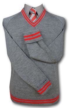 A top quality mid grey 'V' neck jersey with fold back cuffs. Red trim at the neck line, cuffs and welt. Available in sizes from 36" to 48". 100% man made fibres. Fully machine washable. Medium weight and will keep you nice and warm. British made. A range of matching accessories are also available. Fitted Long Sleeve Tops With Striped Cuffs, Fitted Gray Sweater With Ribbed Cuffs, Fitted Red Tops With Ribbed Cuffs, Grey School Shorts, Grey Uniform, Woolen Socks, School Shorts, Neck Line, Matching Accessories