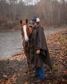 FULL DETAILS: • Unisex• Waterproof & Breathable• Front Zip Pouch• Unlined• Adjustable Shock Cord Hood• Large Gusset V-neck Opening• Poncho Packs Away into Front Zipped Pocket• “D” Ring Attaches to Pack on Saddle• Grommets to Aid in Making it a Shelter KEY FEATURES: • Breathable• Packable• Waterproof MATERIALS: • Oilskin• Polyester LIFESTYLES: • Western• Outdoor• Workwear CARE INSTRUCTIONS: Your oilskin can be cleaned using a dry brush to remove any dirt.If it needs to be washed, use water only a Oilskin Duster, Concealed Carry Jacket, Packable Rain Jacket, Lightweight Vest, Rain Poncho, Outdoor Hats, Leather Hats, Boot Bag, Leather Vest