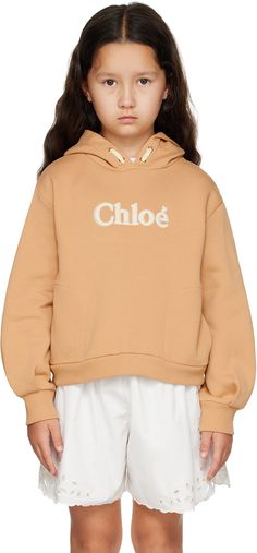 Cotton fleece hoodie. · Drawstring detailing at hood · Logo embroidered at front · Seam pockets · Rib knit hem and cuffs · Tucks at sleeves · Logo-engraved gold-tone hardware · Machine-wash Supplier color: Stone Model measures 50 / 127.0 cm tall and wears size 8Y. Chloé Size: child's height 2Y: 33.75 / 86 cm 3Y: 37 / 94 cm 4Y: 40.25 / 102 cm 5Y: 42.5 / 108 cm 6Y: 45 / 114 cm 8Y: 49.5 / 126 cm 10Y: 54.25 / 138 cm 12Y: 59 / 150 cm 14Y: 61.5 / 156 cm Chloe Kids, Embroidered Hoodie, Color Stone, Cotton Fleece, Fleece Hoodie, Logo Embroidered, Rib Knit, Chloe, Kids Shop