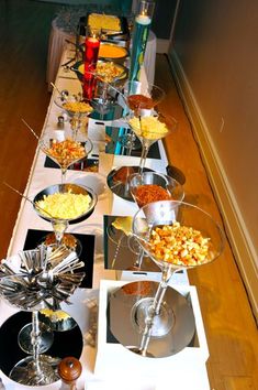 a long buffet table filled with lots of food