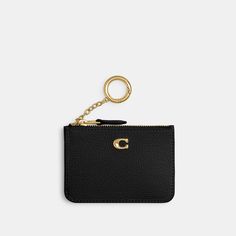 Crafted of polished pebble leather detailed with our Signature hardware the Mini Skinny keeps keys cards and other small essentials stylishly secure. | Coach Mini Skinny Id Case - Women's - Brass/black Elegant Wallets With Key Clip For Everyday Use, Elegant Wallet With Key Clip, Elegant Wallets With Key Clip, Luxury Black Coin Purse With Interior Key Chain Holder, Classic Coach Card Holder For Everyday Use, Classic Everyday Coach Coin Purse, Coach Card Holder With Rfid Blocking For Everyday, Coach Rfid Blocking Card Holder, Coach Rfid Blocking Card Holder For Everyday