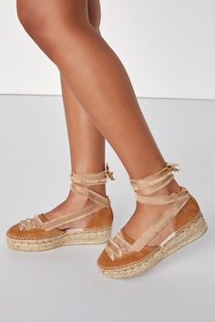 Whether you're hitting the beach or just grabbing drinks, the Free People Destino Peachy Sand Suede Lace-Up Espadrille Platforms will be the epitome of summer style this season! Soft genuine suede leather shapes a rounded toe upper adorned with fringe-trimmed ribbons that create a decorative lace-up design and thread through the matching heel cup to wrap and tie above the ankle. A summery, espadrille-wrapped platform sole lends an ultra-Boho finish! Available in Euro sizes only. 1. 75" espadrill Beige Espadrilles For Beach Season, Beach Season Beige Espadrilles, Gold Espadrilles For Summer Vacation, Gold Espadrilles For Beach Summer, Gold Summer Espadrilles For Vacation, Gold Beach Espadrilles For Summer, Summer Vacation Gold Espadrilles, Gold Espadrilles For Spring Beach Outing, Gold Espadrilles For Beach In Spring