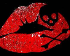 a red lips with glitter on it in the shape of a heart, against a black background