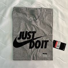 Bnwt, 2nd Photo So You Can See Whole Shirt. Standard Fit 50% Cotton/50% Polyester Nike Gray T-shirt With Logo Print, Gray Sportswear T-shirt With Graphic Print, Nike T-shirt In Athletic Heather With Logo Print, Nike Athletic Heather T-shirt With Logo, Nike Tops In Athletic Heather With Logo Print, Nike Gray Tops With Logo Print, Nike Gray Top With Logo Print, Gray Athleisure Top With Logo Print, Athletic Heather Graphic Tee With Logo Print