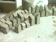 several cement blocks sitting on top of a table