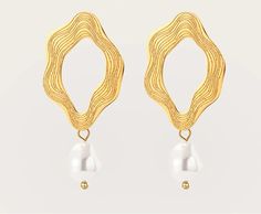 Embrace the Unconventional: The Whisper of the Sea Earrings Unleash your inner trendsetter with the captivating Whisper of the Sea Earrings. These dazzling pieces feature a unique combination of 18k gold-plated, irregular stainless steel and baroque pearls, whispering tales of the ocean's untamed beauty. A Symphony of Textures: The Whisper of the Sea Earrings are a celebration of unconventional elegance. The polished 18k gold plating adds a touch of luxury, while the irregular stainless steel ad Gold-tone Metal Drop Pearl Earrings, Gold-tone Metal Pearl Drop Earrings, Gold Plated Metal Pearl Earrings, Modern Gold Pearl Earrings With Pearl Charm, Trendy Gold Pearl Charm Earrings, Trendy Gold Pearl Earrings, Modern Gold Earrings With Pearl Chain, Yellow Gold Metal Drop Pearl Earrings, Modern Gold Metal Pearl Earrings