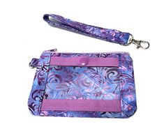 ♥♥ Lanyard:  Measures 1/2 Wide and Approximately 18 inch long without lobster claw. ♥♥ Wristlet: Measures: 1/2 Wide and Approximately 5 1/2 inches long without lobster claw. ID Zipper Pouch ♥♥  Measures long 6" Long x 4 1/2  Inch Tall. ♥♥  Comes with ID Window wallet with snap closer ♥♥  Made with 100% cotton fabric with a layer of interfacing to give it durability. Perfect for holding credit cards, keys, lip stick anything you need to grab and go! ♥♥  YKK  Zipper may vary in color, but will always coordinate.     ♥♥ Pattern placement may vary due to this being handmade and made to order.  ♥♥ ♥♥  All Item are made in a Smoke free pet free Studio Custom orders are always welcome! https://www.etsy.com/shop/GrandmasLittleLilly?ref=seller-platform-mcnav§ion_id=27045635 Purple Rectangular Coin Purse For Everyday Use, Rectangular Purple Coin Purse For Everyday Use, Adjustable Wristlet With Cell Phone Pocket For Everyday Use, Purple Pouch Wristlet Gift, Purple Pouch Wristlet As Gift, Adjustable Zipper Pouch Wristlet For Daily Use, Rectangular Wristlet With Zipper Pouch As Gift, Adjustable Wristlet With Cell Phone Pocket For Gifts, Adjustable Wristlet With Zipper Pouch For Daily Use