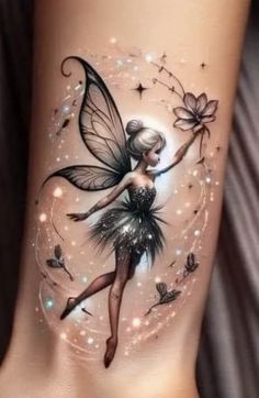 a woman's leg with a tattoo on it that has a fairy holding a flower