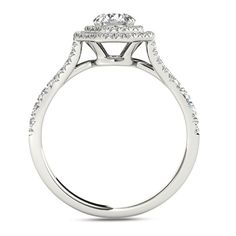 Make the moment magical with this eye-catching diamond engagement ring. Fashioned in cool 14K white gold, this ring showcases a 1/2 ct. round diamond center stone. A double octagonal frame lined with smaller round accent diamonds surrounds the center stone, while additional diamonds line the ring's shank. A meaningful symbol of your love and commitment, this engagement ring delights with 1 ct. t.w. of diamonds and a polished shine. Round Diamonds, Diamond Engagement Rings, White Gold, Engagement Rings, Thing 1, Stone, Frame