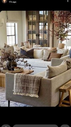 a living room filled with lots of furniture