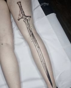 Life sized sword on the back of the leg Swords On Leg Tattoo, Full Length Leg Tattoo, Back Of Thigh Tattoo, Fairy Wing Tattoos, Body Armor Tattoo, Full Leg Tattoos, Armor Tattoo, Blackwork Tattoos