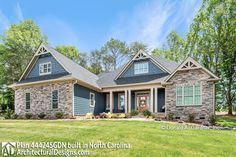 this is an image of a home for sale in north carolina with stone and shingles