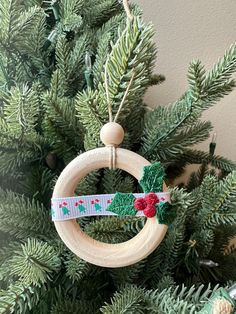 an ornament hanging from a christmas tree