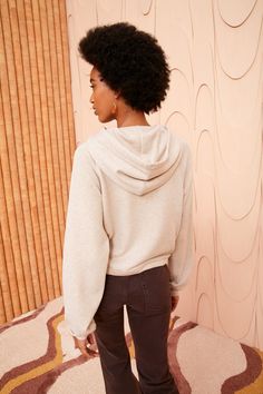 Made from our new cotton and bamboo fleece, our Iggy Hoodie is a relaxed sweatshirt silhouette elevated with tonal hand-crochet trims around the front pocket. This cozy cream-hued top features voluminous long sleeves and has drawstrings at the hood and hem. Composition: 59% Organic Cotton, 41% Bamboo Viscose Style with our Lou Jean and Stone Drop Earring to complete the look.