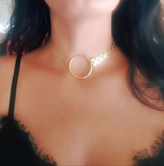 "♦ A beautiful choker necklace, made of metal gold-plated brass in a very high quality with a hoop pendant in its center. SIZA: length 11.8 \" (30 cm) up to 15.8\" ( 40 cm) wide chain 0.47 \" ( 1.2 cm) ♦ This piece of jewelry is perfect as a gift for yourself, for a wedding day, Valentine's day or a birthday. ♦ The jewel will be sent by registered mail (to some countries also includes a tracking number), more information in the F&Q. ♦ My Etsy Shop: http://etsy.me/2rdJm27 Thank you for your i Gold-tone Round Jewelry For Party, Gold Circular Jewelry With Adjustable Chain, Gold Hoop Jewelry For Party, Nickel Free Metal Choker, Gold Circular Metal Ring Jewelry, Metal Round Choker For Party, Metal Choker For Party, Gold Plated Clavicle Chain Jewelry, Gold Circle Jewelry For Festivals