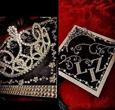 two black and white napkins sitting on top of a red table covered in diamonds