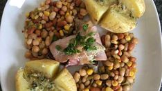 a white plate topped with different types of food