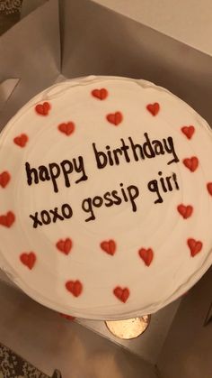 a white cake with red hearts on it that says happy birthday xoxo gossip girl