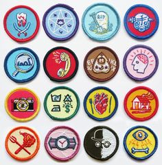 nine different colored patches with symbols on them