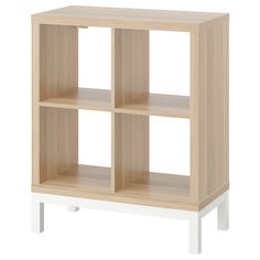 a wooden shelf with three shelves on one side and two black legs, against a white background