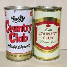 two cans of country club next to each other