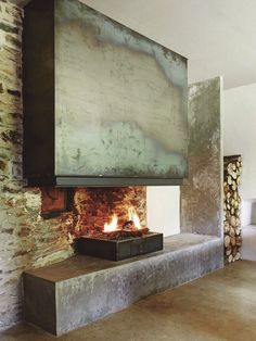 a fire place in the middle of a room