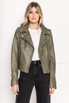 Classic, edgy, and oh-so-flattering, the Donna biker jacket is the wardrobe staple you’ve been waiting for. With its sharp notch lapels, zippered sleeves, and asymmetrical zipper, this iconic top-piece offers vintage appeal with a flawlessly tailored fit. Designed with premium leather that only becomes more appealing with age, the Donna is guaranteed to stick around. Wishlist 2022, Leather Jacket Girl, Leather Outerwear, Biker Jackets, Leather Biker Jacket, Olive Color, Leather Outfit, Women Leather, Biker Jacket