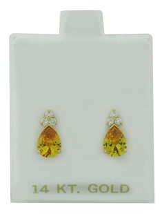 Karat : 14K Yellow Gold  Gemstones : 2 created Yellow Topaz  Total ct weight : 1.96 carats  Yellow topaz grades,  Hue . . . yellow  Tone . . . medium dark  Saturation . . .  vivid  No inclusions or flaws 6 created White Sapphires - 0.03 ct each  Dimension of earrings : 12 mm (0.47") x 6 mm (0.23")  Type of Setting : prong  Shape of Stone : pear & round   PLEASE READ THE FOLLOWING INFORMATION!    International Customers:  The import duties, taxes and charges will not included in the item price or shipping charges and are the buyer's responsibility. Before placing a bid, please review what the charges will be with your country's customs office. We are not responsible for any extra fees they set. By bidding on this item, you are aware of this circumstance. Return Policy | Rules and Regulation Topaz Yellow, Sapphire Earrings Studs, Yellow Tone, Dark Autumn, Sapphire Studs, Gold Sign, Autumn Clothes, Yellow Tones, Sapphire Earrings