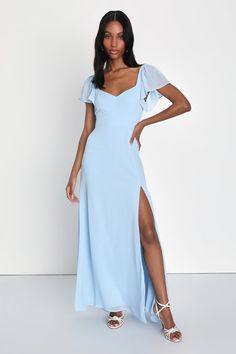 You'll be the toast of the party when you arrive in the Lulus Simply Delightful Light Blue Tie-Back Flutter Sleeve Maxi Dress! Airy woven chiffon shapes this gorgeous dress that has short flutter sleeves and a seamed bodice with an empire waist. At the back, long sash ties cross the open back. Skirt has an A-line silhouette and falls to a maxi hem with a flirty thigh-high side slit. Hidden zipper/clasp at back. Light Blue Bridesmaid Dresses, Light Blue Bridesmaid, Light Blue Tie, Color Celeste, Baby Blue Dresses, Maid Of Honour Dresses, Blue Bridesmaid Dress, Long Blue Dress