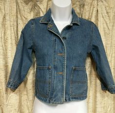 A nice GAP girls Blue Jean Jacket size XS/TP (4). Has patch pockets on front with button up front and hidden zipper (see Photos) Belted look on back. Armpit to cuff is 10.5 inches. 18 inches from bottom hem to shoulder at the collar. Denim Jeans Jacket, Blue Jean Jacket, Jeans Jacket, Gap Denim, Denim Jean Jacket, Blue Jean, Look On, Hidden Zipper, Jean Jacket