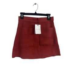 Length: 16" Waist: 13 1/2" Size: Small Red Casual Skort For Fall, Red Mini Skirt With Pockets, Red Casual Mini Skirt For Winter, Fitted Red Mini Skirt With Pockets, Casual Red Skort For Winter, Trendy Red Skirt With Pockets, Chic Red Skort For Fall, Red Skort With Pockets For Spring, Casual Red Relaxed Skort