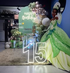 an image of a birthday party with balloons and princess dress on display in front of the room