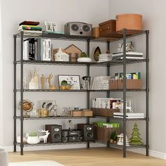 a living room filled with furniture and shelves