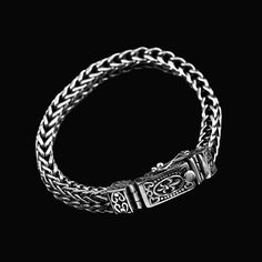 From the timeless art of handcrafting, where tradition meets modern elegance, comes a bracelet that embodies both strength and sophistication. Our Handwoven Rope Twist Bracelet features an intricate rope twist pattern, symbolizing unity and resilience. Crafted from high-quality materials, this bracelet combines durability with a refined aesthetic. Perfect for those who appreciate unique and stylish accessories, this bracelet adds a touch of classic charm to any outfit. Made from high-quality mat Classic Adjustable Bracelet With Intricate Design, Classic Adjustable Sterling Silver Bracelet With Intricate Design, Elegant Engraved Braided Bangle Bracelet, Elegant Braided Sterling Silver Bracelet Gift, Elegant Adjustable Sterling Silver Bracelet With Stainless Steel Clasp, Elegant Sterling Silver Bracelet With Adjustable Stainless Steel Clasp, Adjustable Spiritual Bracelets With Intricate Design, Adjustable Spiritual Bracelet With Intricate Design, Traditional Adjustable Bangle Chain Bracelet