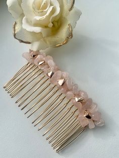 Gemstone hair comb. This crystal hair comb is decorated with  rose quartz crystals and tiny gold love heart beads.  All placed carefully with non tarnish gold plated wire on a gold hair comb. A lovely decorative hair comb  A really simple hair piece which has been carefully hand beaded, which would look gorgeous in bridal hair or just adding the finishing touches to styled hair.  Comb size Approx 76mm by 37mm. Hand beaded made to order, larger orders can be made for weddings, bridesmaids etc, pl Rose Quartz Hair, Gemstone Hair, Decorative Hair Combs, Boho Headpiece, Gold Hair Comb, Pearl Hair Combs, Crystal Hair Accessories, Bridesmaid Hair Accessories, Crystal Hair Comb