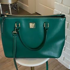 Gorgeous Hunter Green Dooney & Bourke Bag. Gorgeous Red Lining, No Scratches, No Stains From A Non Smoking Home. Comes With A Matching Wallet. Dooney & Bourke Bag, Dooney & Bourke Bags, Hunter Green, Dooney Bourke, New Color, Shoulder Bags, Bag Lady, Like New, Wallet