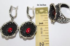 Poppy flower jewelry red poppies SILVER 925 Earrings and ring SET with lab garnet stone Flower Black and red jewelry Floral dark jewellery FREE shipping Worldwide (tracked) Earrings: Sterling silver 925, lab garnet Weight: 15.2 grams Length: 1.8 inch = 4 cm Ring: Sterling silver 925, lab garnet Weight: 10 grams IF YOU NEED JUST EARRINGS, BUT the system requires RING SIZE, just choose Earrings and ANY ring size. In orders I will see that you bought just earrings and paid just for EARRINGS. Shippi Emerald Green Jewelry, Burgundy Earrings, Emerald Green Stone, Marcasite Earrings, Dark Jewelry, Black Poppy, Evening Jewelry, Unusual Earrings, Flower Black