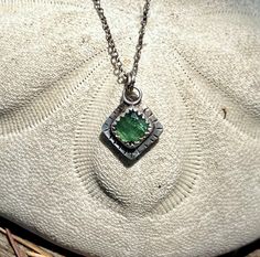 How cute is this pendant? This center stone is a gorgeous rose cut green tourmaline. It is set on the pointed end into a sterling silver sawtooth bezel with textured outer edge, then suspended from a sterling silver 18" link chain with a lobster claw clasp.  Both have an antique patina and are sealed, to help prevent tarnishing. it is about 1/2" across with a total drop of .75". This one of a kind pendant is the perfect size to be worn alone for a minimalist look or layered with your other treas Green Hammered Sterling Silver Jewelry, Green Sterling Silver Hammered Jewelry, Green Sterling Silver Jewelry With Rectangular Pendant, Minimalist Green Square Pendant Necklace, Green Sterling Silver Rectangular Pendant, Unique Green Square Pendant Jewelry, Green Tourmaline Pendant, Green Tourmaline, Link Chain