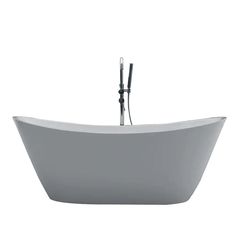 a white bath tub sitting next to a faucet