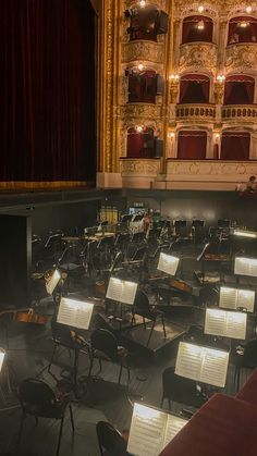 an empty auditorium filled with lots of musical instruments