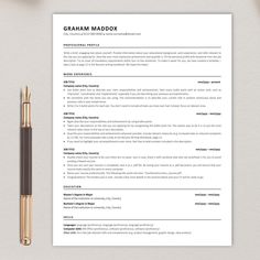 a professional resume template is shown on top of a desk