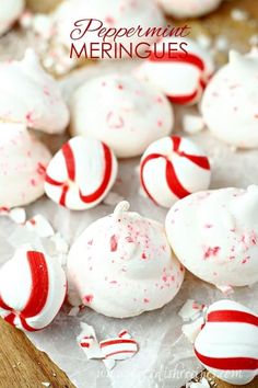 peppermint oreo truffles with white frosting and red sprinkles