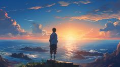 a man standing on top of a cliff looking out at the ocean while the sun sets