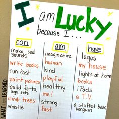 i am lucky poster hanging on the wall in front of a whiteboard with words