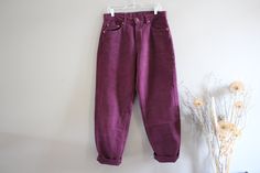 ✂-----f e a t u r e s---------------- * Levi Strauss 554 * burgandy * canvas * high waist * wide leg * loose fit * zip fly * 5 pockets * in great vintage condition ✂------m e a s u r e m e n t s---------------- Measurements are taken from seam to seam while the garment is lying flat.  * For the most accurate fit, please always refer to the below actual measurements.  1. Waist - 17 Inches 2. Front Rise - 12.5 Inches 3. Hips - 24 Inches 4. Thigh - 14 Inches 5. Length (Outer Seam) - 40.5 Inches 6. Length (In Seam) - 30 Inches 7. Knee - 10 Inches 8. Leg Opening - 9 Inches Item weight - 806 grams ♥ Visit my shop https://www.etsy.com/ca/shop/amilialia All the vintage goodies in my shop are carefully hand-picked by myself in CANADA. The quality of the garment will be checked thoroughly before lis Burgundy Straight Leg Cotton Jeans, Burgundy Cotton Straight Leg Jeans, Burgundy Cotton Jeans For Fall, Cute Jackets, Cool Sweaters, Softest Sweater, Levi Strauss, Vintage Levis, Vintage Tags