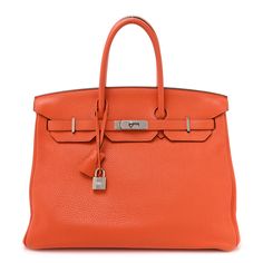 This is an authentic HERMES Taurillon Clemence Birkin 35 in Orange. This stunning Birkin classic tote is crafted of togo calfskin leather in bright orange. The bag features rolled leather top handles, a cross over flap, a strap closure, silver plated clasps with a silver turn lock, and a clochette for the keys. These open to a leather interior for with zipper and patch pockets. Birkin 25, The Keys, Hermes Bags, Hermes Birkin, Leather Interior, Bright Orange, Birkin Bag, Leather Top, Hermes Bag Birkin