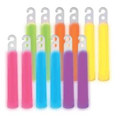 neon colored toothbrushes are lined up in a row