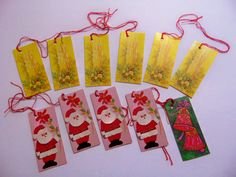 six christmas tags with santa clause on them