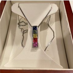 Necklace Costco- 14kt White Gold, Rainbow Sapphire Pendant. 17 Inch Box Chain, 2mm Princess Cut Sapphires. Excellent Condition! Multicolor Hallmarked Necklace For Anniversary, Elegant Multicolor Diamond Cut Jewelry, Sterling Silver Channel Set Jewelry Gift, Fine Jewelry Gift With Channel Set, Gift White Gold Channel Set Jewelry, Fine Jewelry Channel Set As Gift, Sterling Silver Channel Set Jewelry As A Gift, Fine Jewelry Channel Set For Gift, Elegant Sterling Silver Necklace With Channel Set